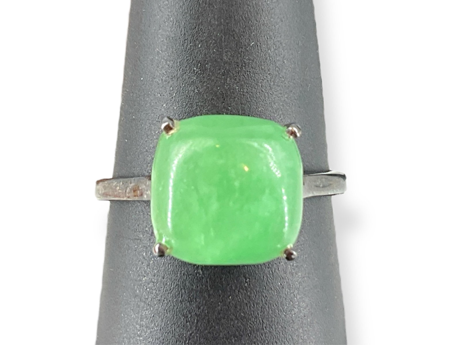 Sterling Silver Ring: Sterling Silver Ring With 6.0mm jade stone cabochon, stamped and/or tested sterling silver/925, size 9, 0.10 troy ounces total weight. Signed STS.