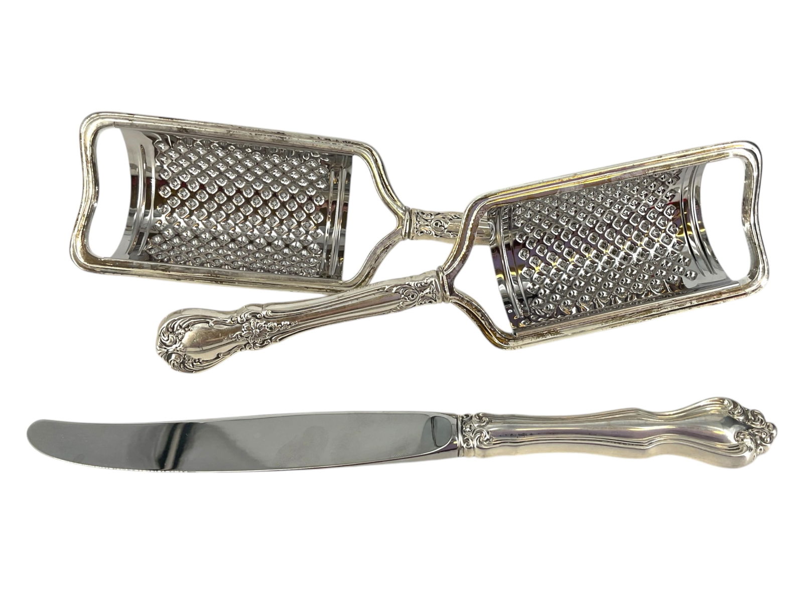 Two Vintage Sterling Silver Cheese Graters and a Decorative Dinner Knife: Two Vintage Sterling Silver Cheese Graters and a Decorative Dinner KnifeGraters are approx 8 1/2" tall and are hallmarked "Towle Sterling 925" on the handle, grater portion is likely stainless steel,