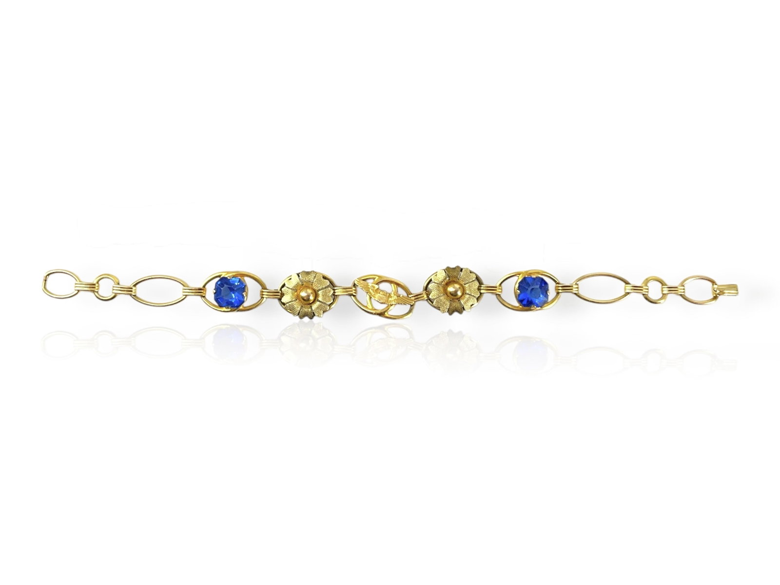 Lovely Vintage Bracelet with Military Insignia and Blue Fashion Stone Decoration: Lovely Vintage Bracelet with Military Insignia and Blue Fashion Stone Decoration This pretty bracelet is approx 7î long and is in marked and tested gold-fill, it has a flower design and two bright bl
