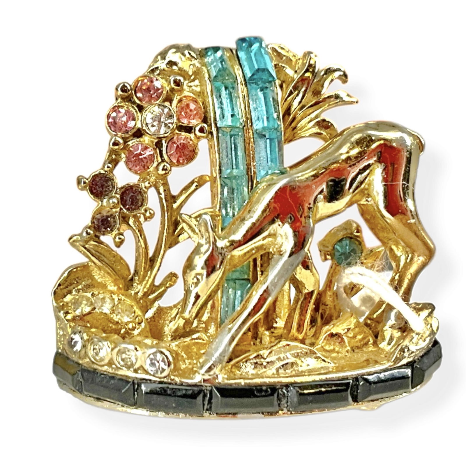 Charming Stamped ìCoro Craftî Pin Depicting a Deer at a Waterfall: Charming Stamped ìCoro Craftî Pin Depicting a Deer at a WaterfallIn gold-tone metal with pink, purple, blue and black fashion crystals is this hallmarked ìCoro Craftî brooch which features a deer