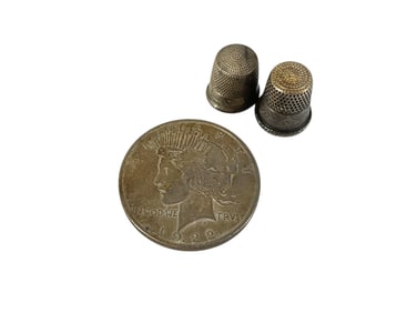 Two Vintage Sterling Silver Thimbles and a Liberty Dollar Coin from 1922