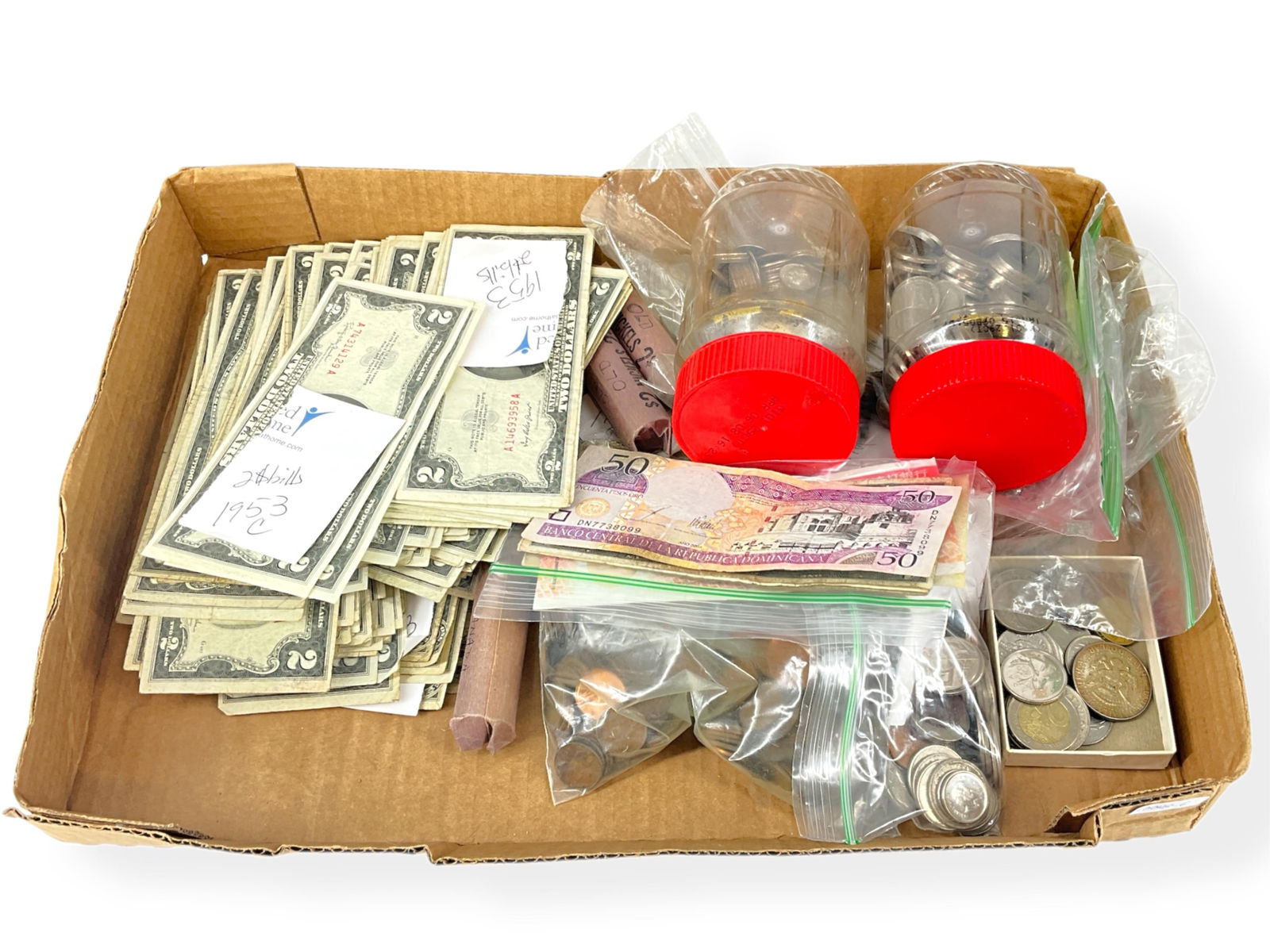 Assortment of Coins, Currency, and Tokens: Assortment of Coins, Currency, and TokensBuffalo nickels and Canadian nickels in rolls, modern dimes and modern nickels in two clear containers, three 90% fine silver half dollar coins including two B