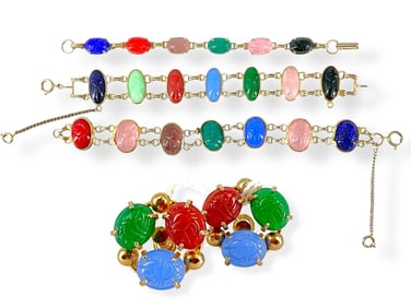 Three Vintage Scarab Bracelets and a Pair of Scarab Earrings