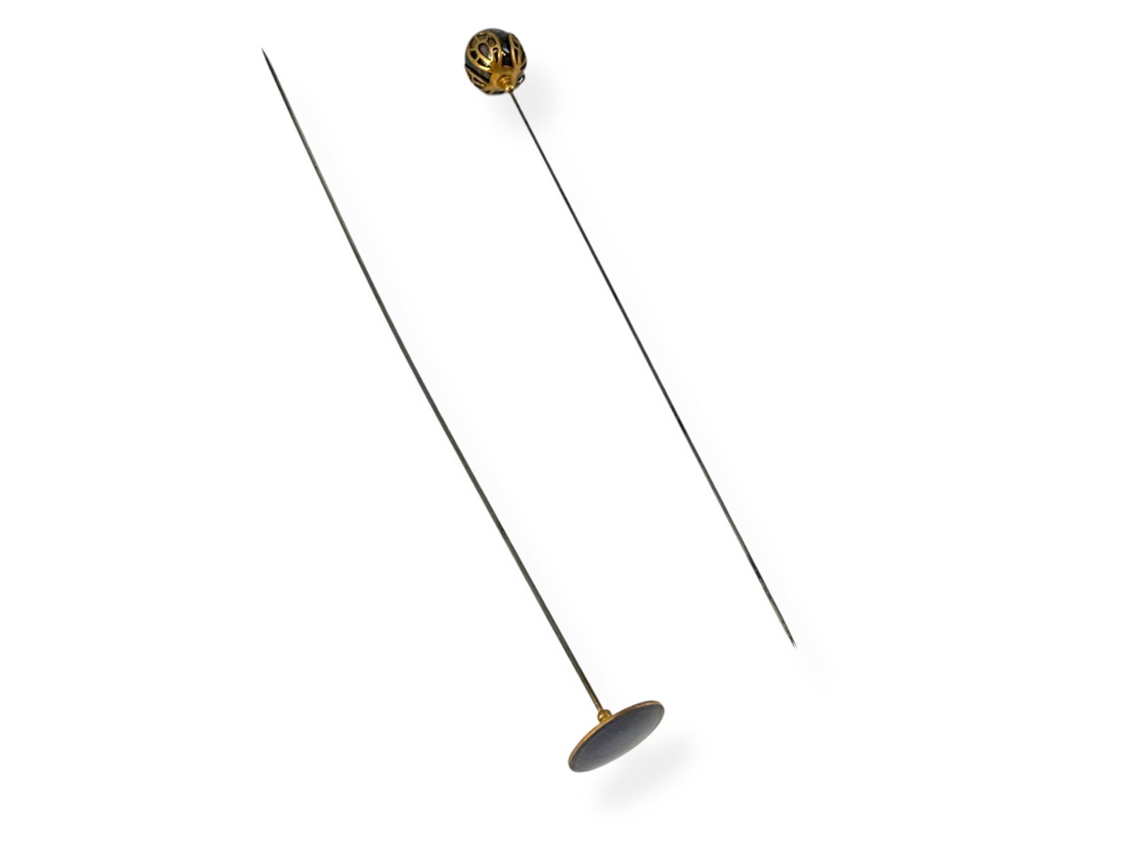 Two Nice Hatpins - One w/GuillochÈ Enamel: Two Nice Hatpins - One w/GuillochÈ EnamelLot contains two hatpins, the first is 9 1/2" tall having a flat circular top @ approx 3/4" wide covered in purple GuillochÈ enamel and the second one is app