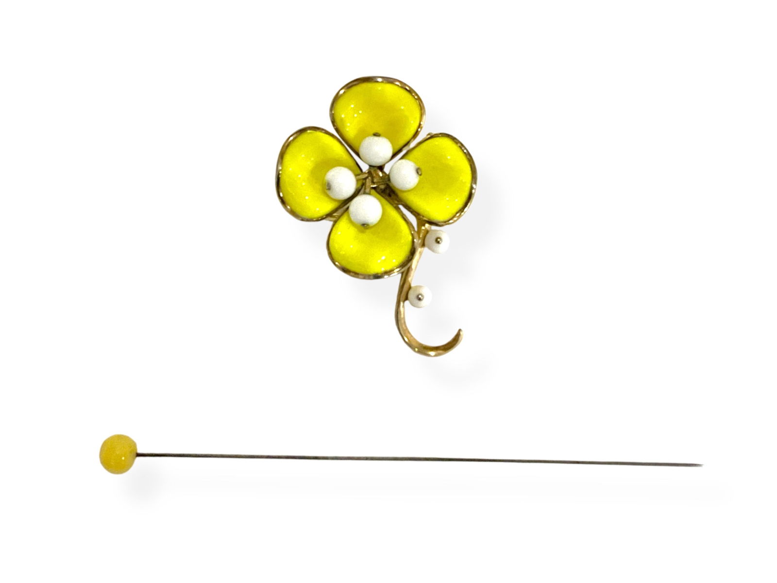 Vintage Yellow & White Beaded Trifari Flower Brooch and Vintage Hatpin in Yellow Glass: Vintage Yellow & White Beaded Trifari Flower Brooch and Vintage Hatpin in Yellow GlassVintage gold-tone brooch is hallmarked "Trifari" and is in a flower design with bright yellow "leaves" and white b
