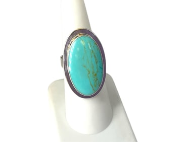 Pretty Blue Turquoise Stone in Silver Mounting