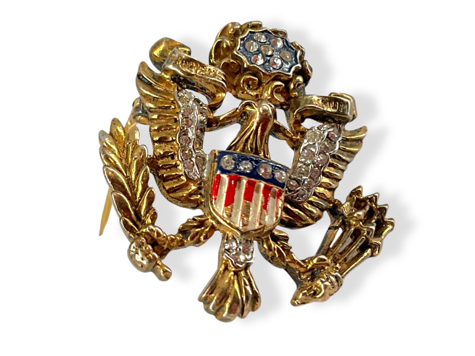 Vintage Signed "Trifari" w/Crown Logo Patriotic Pin in Silver w/Gold Overlay: Vintage Signed "Trifari" w/Crown Logo Patriotic Pin in Silver w/Gold OverlayPatriotic pin is hallmarked "Trifari" with the crown logo and is also marked "Sterling." Pin tests silver and copper with a