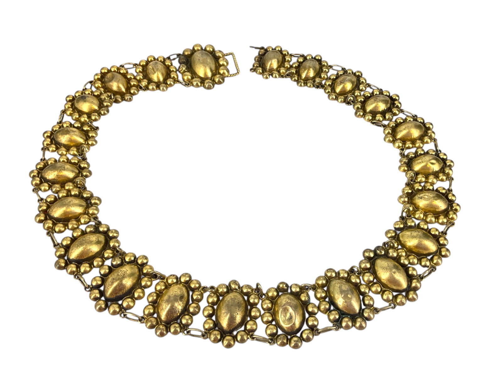 Sterling Silver Belt: Sterling Silver BeltSouthwestern design, no stamps or signatures, tested sterling silver with gilt overlay (vermeil), 26.5" in length, damaged clasp (missing elements), 32.5mm in width, semi-poli