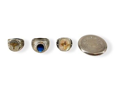 Three Military Themed Rings in Silver and a Silver US Navy Sack Race Award