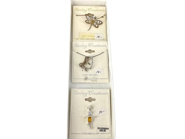 Three Sterling Silver Pendants
