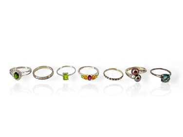 Seven Silver Rings in a Size 8 with Pearls, Peridots and More