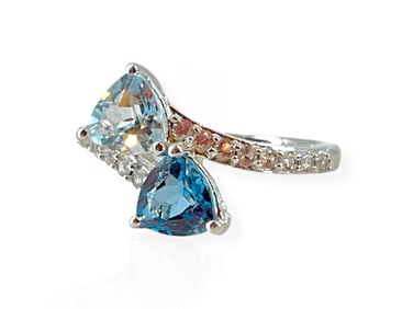 Very Pretty Blue Topaz and White Sapphire Ring in Silver