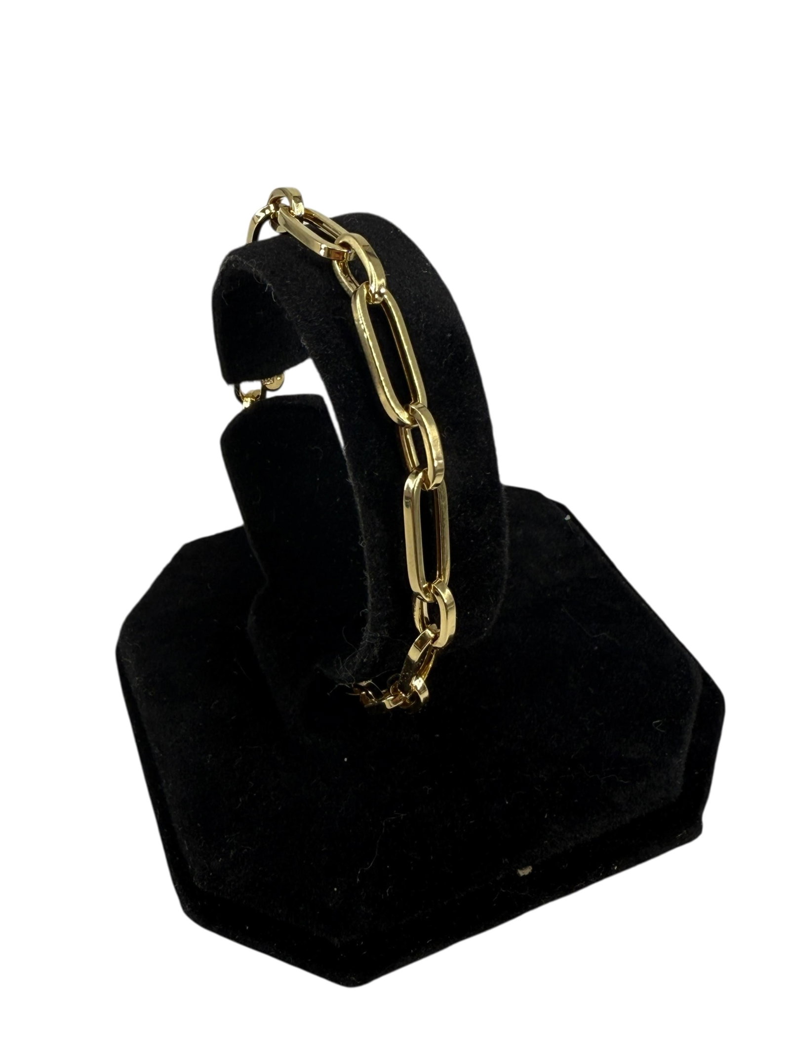 14kt Yellow Gold Bracelet: 14kt Yellow Gold Bracelet Made in Italy, modern design, stamped and tested 14kt yellow gold, 7.75" in total length, 5.25mm in width, 3.4 grams total weight, high polish metal finish, lobster claw
