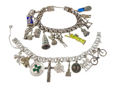 Two Silver Charm Bracelets with Charms