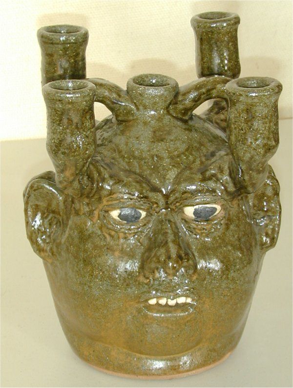LANIER MEADERS STONEWARE GROTESQUE DBLE FACE JUG: LANIER MEADERS STONEWARE GROTESQUE DBLE FACE JUG W/4 SOCKET CANDLE HOLDER 10"H