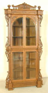 5385: HIGHLY CARVED OAK CORNER CUPBOARD W/FULL FLUTED P