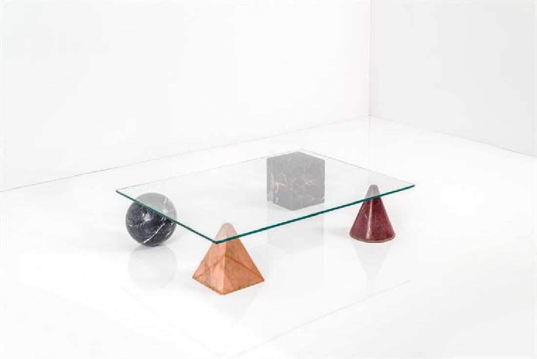 VIGNELLI MASSIMO_x000D_ Tavolino mod. Metafora: Basi geometriche in marmi diversi, piano in vetro trasparente.Prod. Casigliani 1979cm 22x120x79