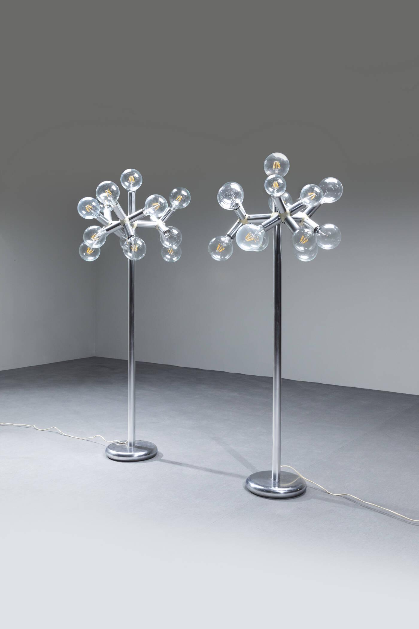 ROBERT HAUSSMANN: Pair of floor lamps in aluminum, cast iron base and plastic details. Prod. Swiss Lamp 1965 ca. h cm 162x60x60