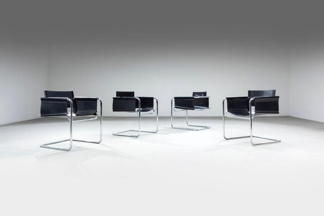 PRODUZIONE ITALIANA: PRODUZIONE ITALIANA Quattro poltroncine Struttura in acciaio, seduta e schienale in pelle. Anni '70 cm 79x57x65 Difetti