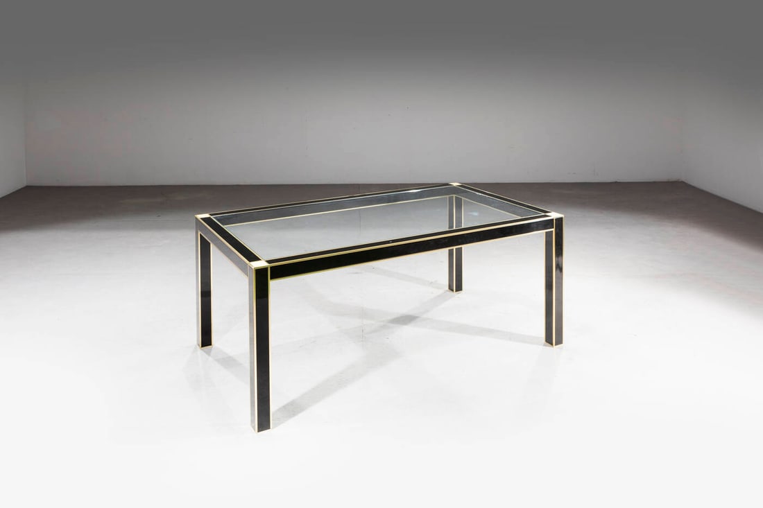 PIERRE CARDIN: PIERRE CARDIN Tavolo da pranzo Struttura in legno laccato, piano in vetro e particolari in ottone. Anni '70 cm 75x180x100 Difetti