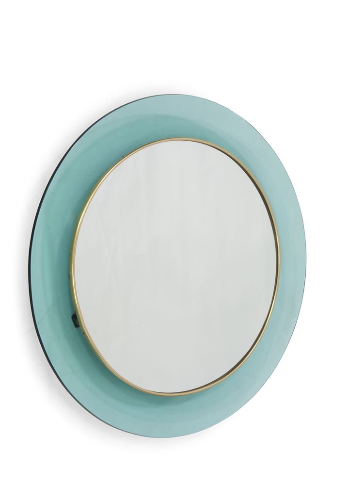 INGRAND MAX Mod. 1669 Specchio da parete in cristallo: Prod. Fontana Arte anni '60 diam cm 78,5 Bibl.: Quaderni Fontana Arte n° 2, 1962, pag. 27 Domus n° 424, marzo 1965 Vitrum n° 169, giugno 1965, pag. 29 Catalogo Fontana Arte n° 10, 1967