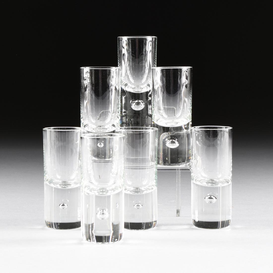 A SET OF SEVEN KOSTA BODA CLEAR CRYSTAL SHOT GLASSES (1 of 3)