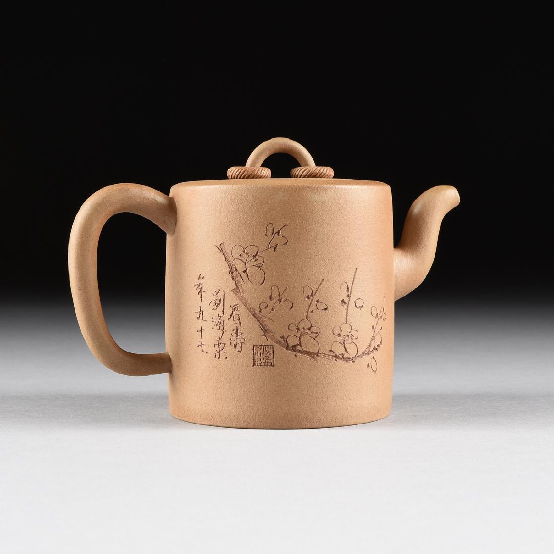 A CHINESE TAN STONEWARE TEAPOT, YIXING PROVINCE, LATE (1 of 10)