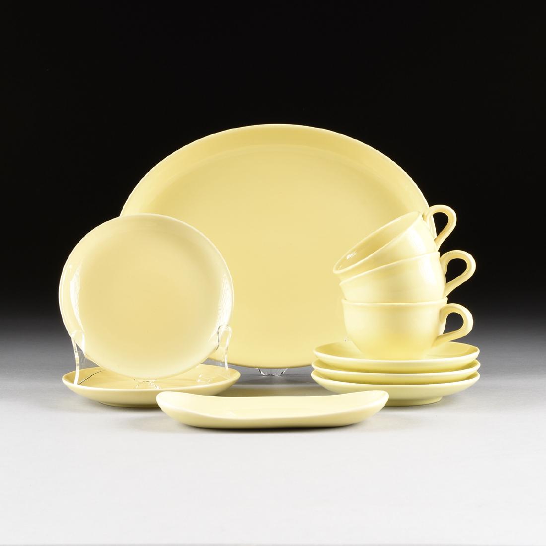 A GROUP OF TEN PIECES OF RUSSEL WRIGHT (American,: A GROUP OF TEN PIECES OF RUSSEL WRIGHT (American, 1904-1976) LEMON GLAZED "CASUAL CHINA" DINNERWARE, FOR IROQUOIS CHINA CO., SYRACUSE, NEW YORK, DESIGNED 1947, comprising three tall tea cups, height: