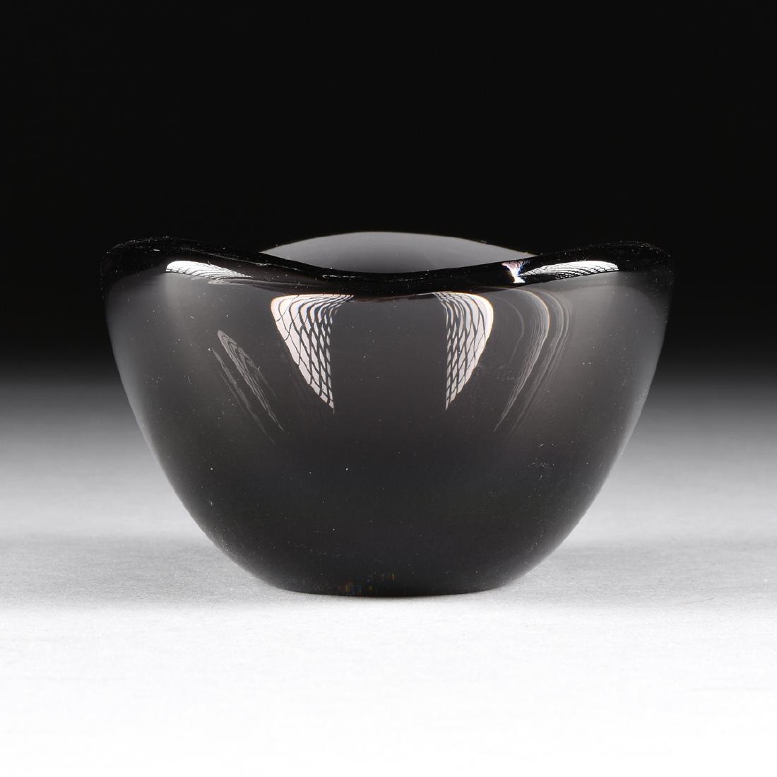A SVEN PALMQVIST (Swedish, 1906-1984) "SELENA" FREEFORM: A SVEN PALMQVIST (Swedish, 1906-1984) "SELENA" FREEFORM GLASS BOWL, FOR ORREFORS, SWEDEN, CIRCA 1960, the opalescent smoke gray thick walled glass bowl with undulating rim, marks: "ORREFORS, PU 3092/1