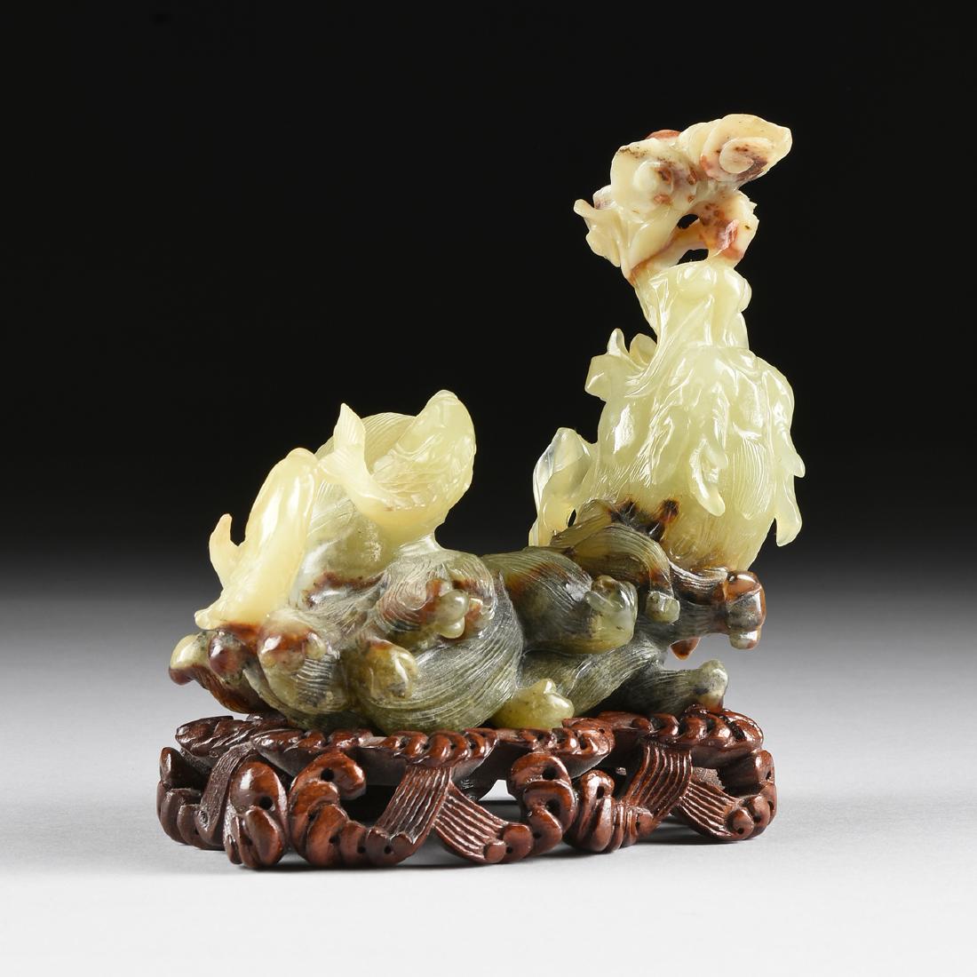 A CHINESE CELADON JADE SEA DRAGON AND FISH GROUP, (1 of 8)