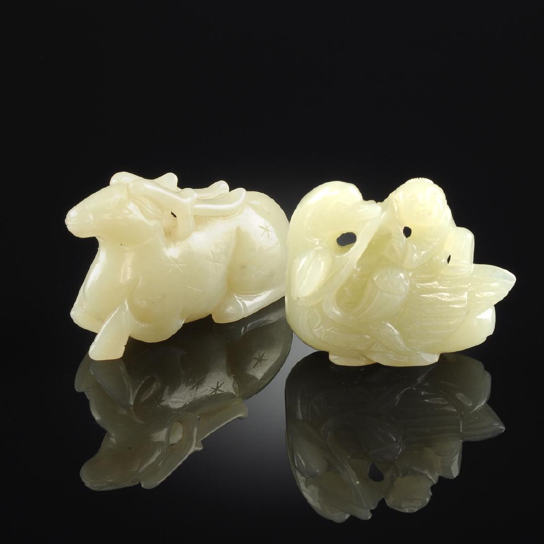TWO CHINESE CARVED CELADON JADE FIGURAL PENDANTS, 20TH (1 of 7)
