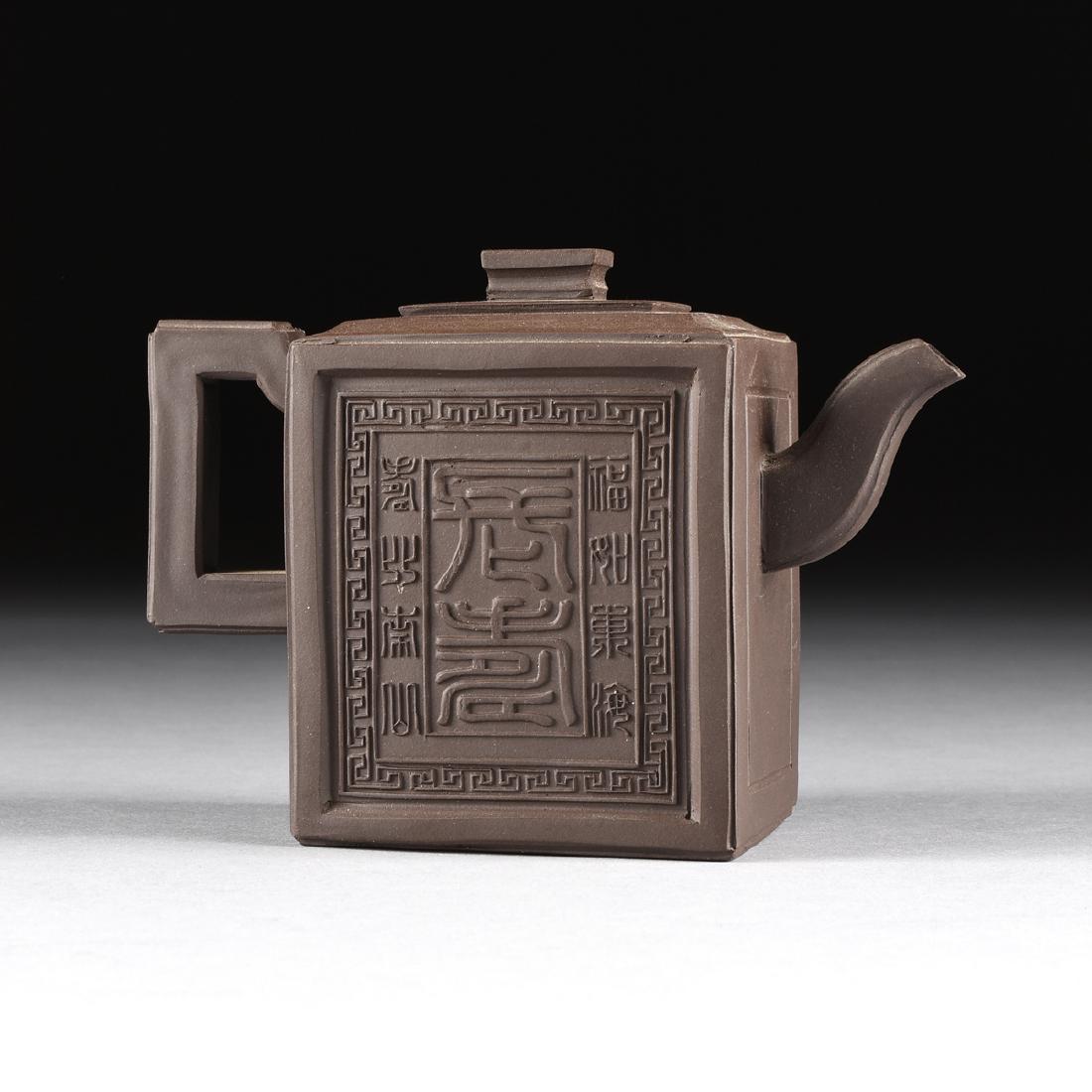 A CHINESE RED STONEWARE TEAPOT, YIXING PROVINCE, LATE (1 of 10)