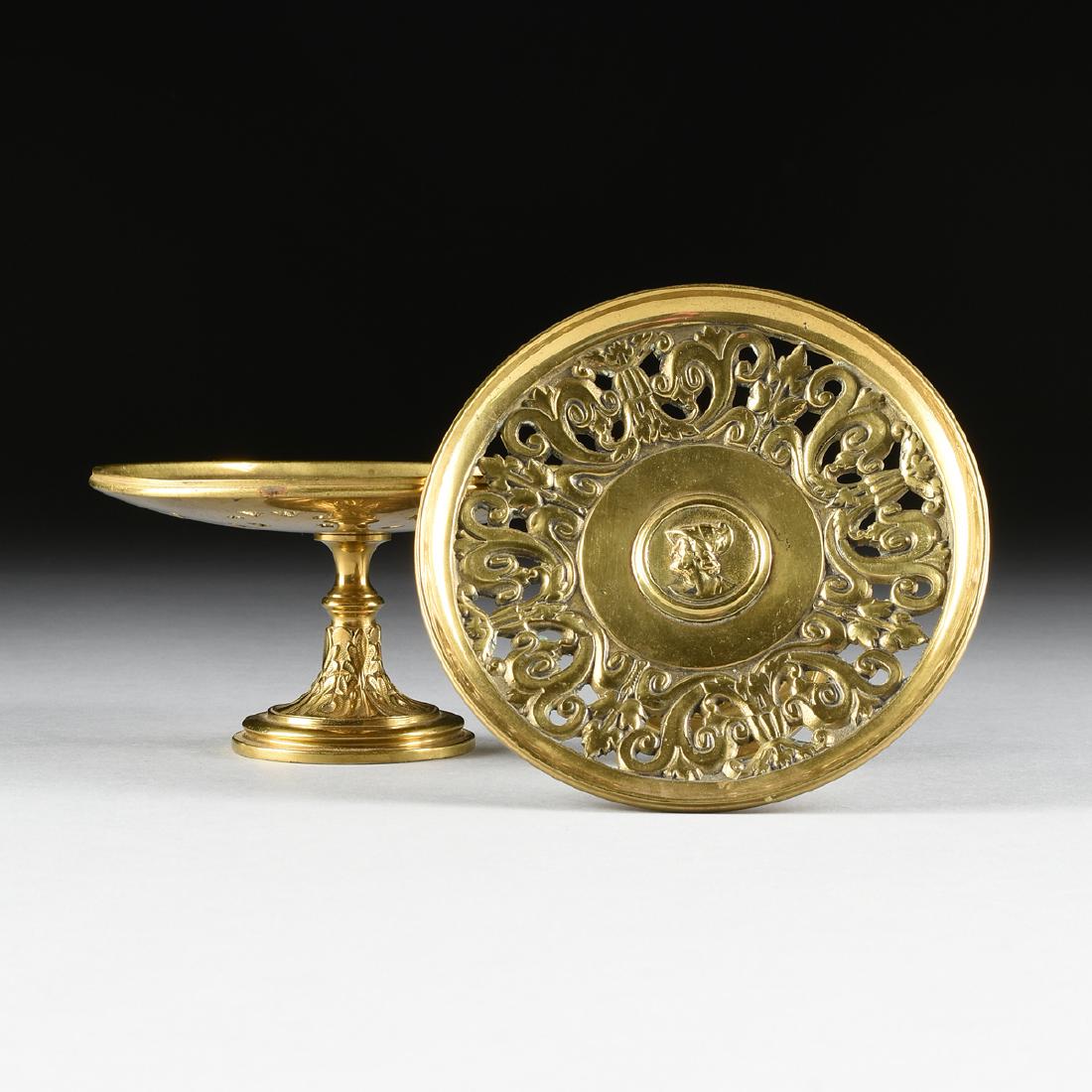 A PAIR OF CAST BRASS MEDALLION PLATE STANDS, PROBABLY (1 of 7)