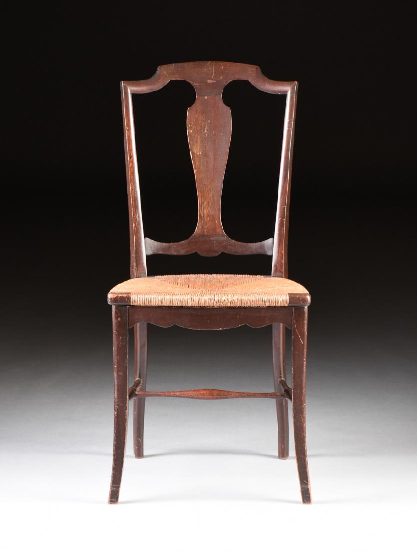 A COUNTRY HEPPLEWHITE STYLE CARVED MAHOGANY RUSH SEAT: A COUNTRY HEPPLEWHITE STYLE CARVED MAHOGANY RUSH SEAT SIDE CHAIR, EARLY 20TH CENTURY, the serpentine crest rail over a vasiform splat, above a bowed trapezoidal woven rush seat, to a serpentine skirt,