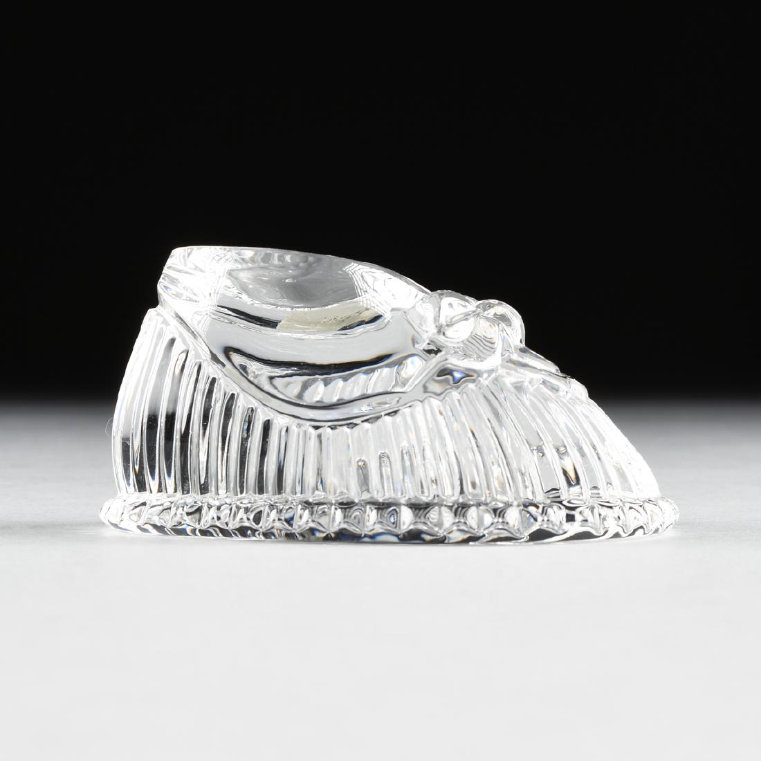 A WATERFORD MOLDED CLEAR CRYSTAL PAPERWEIGHT IN THE (1 of 5)