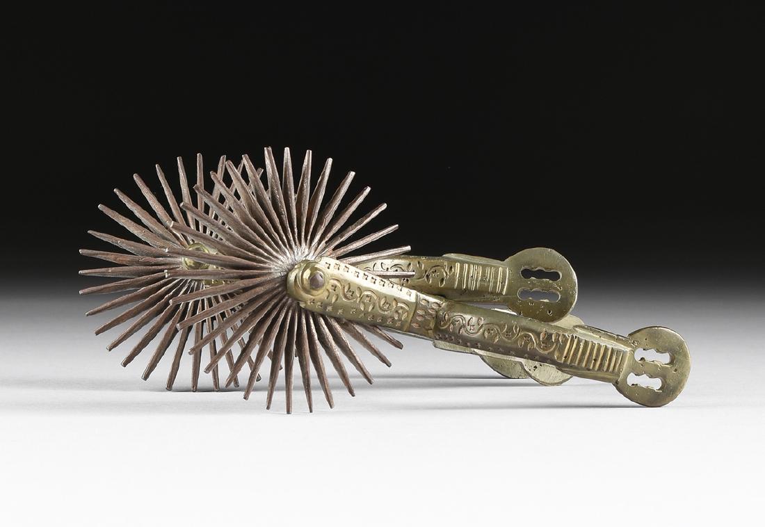 A PAIR OF MEXICAN SCROLLING FOLIATE DECORATED SILVERED (1 of 9)