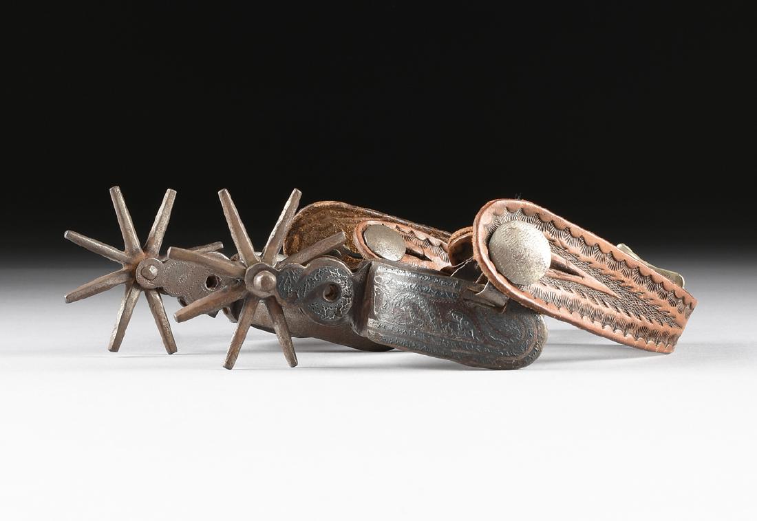 A PAIR OF MEXICAN ENGRAVED AND SILVER INLAID CHARRO (1 of 5)