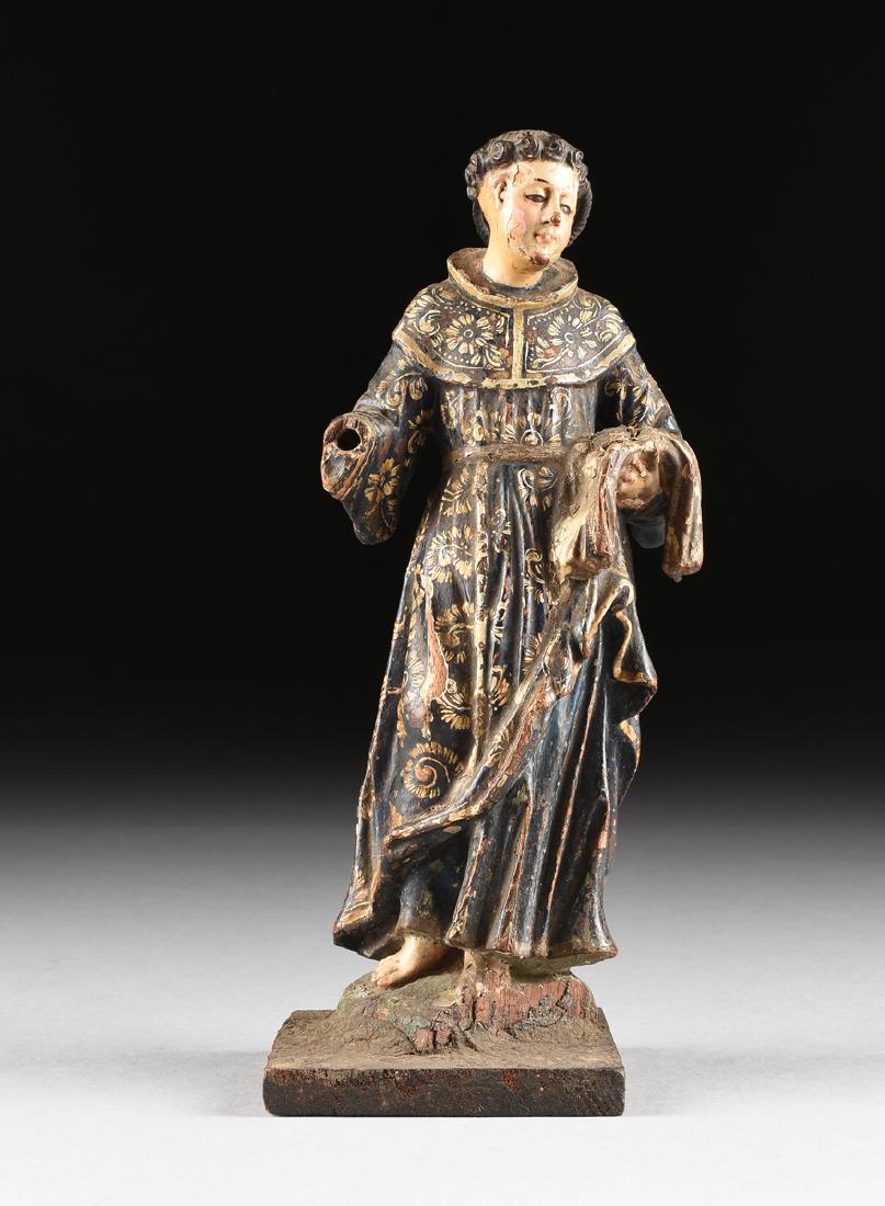 A SPANISH COLONIAL POLYCHROME AND CARVED WOOD SANTO (1 of 8)