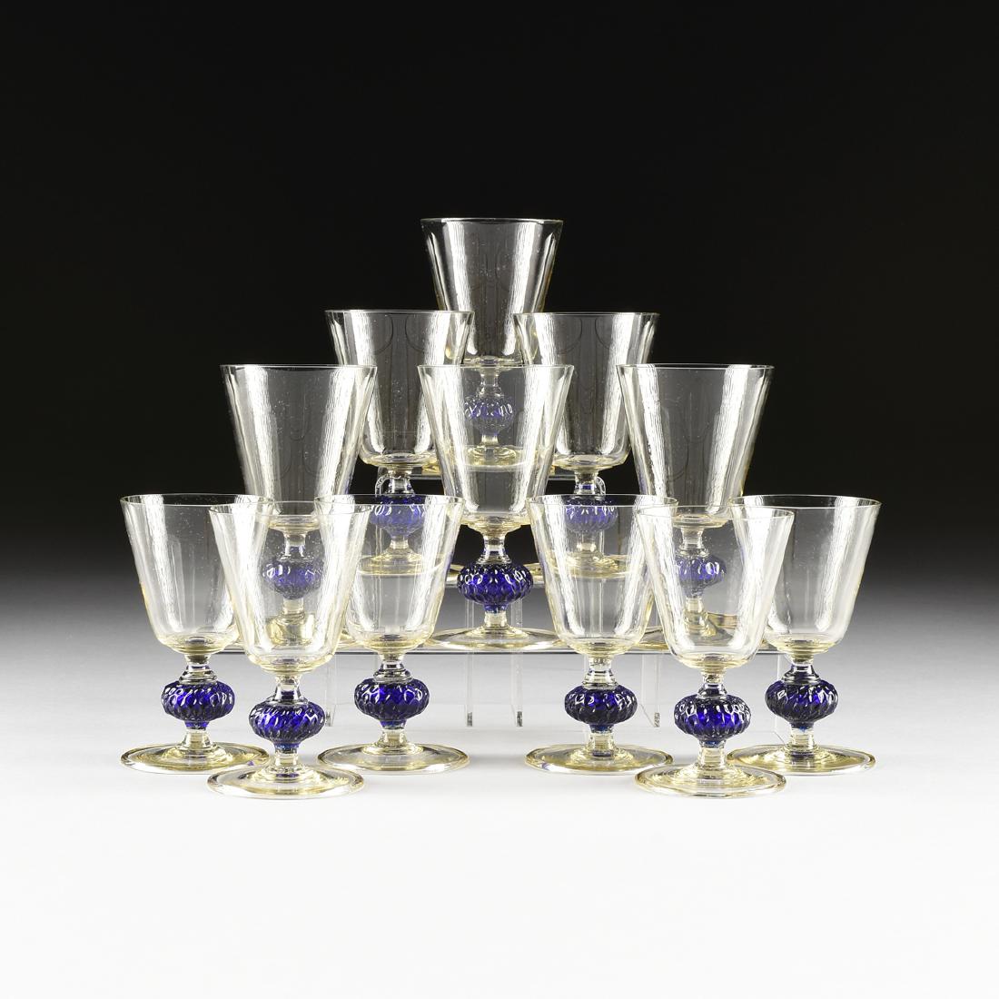 A SET OF TWELVE AMERICAN DEPRESSION WINE GLASSES,: A SET OF TWELVE AMERICAN DEPRESSION WINE GLASSES, POSSIBLY STEUBEN GLASS WORKS, CORNING, NEW YORK, CIRCA 1930, the pale yellow glasses with tapering bowl and spreading foot, raised on baluster form st
