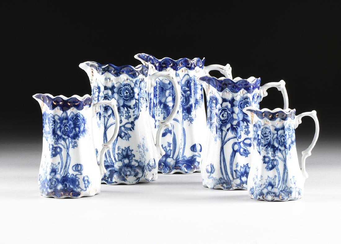 A SET OF FIVE DOULTON BURSLEM BLUE AND WHITE GRADUATED