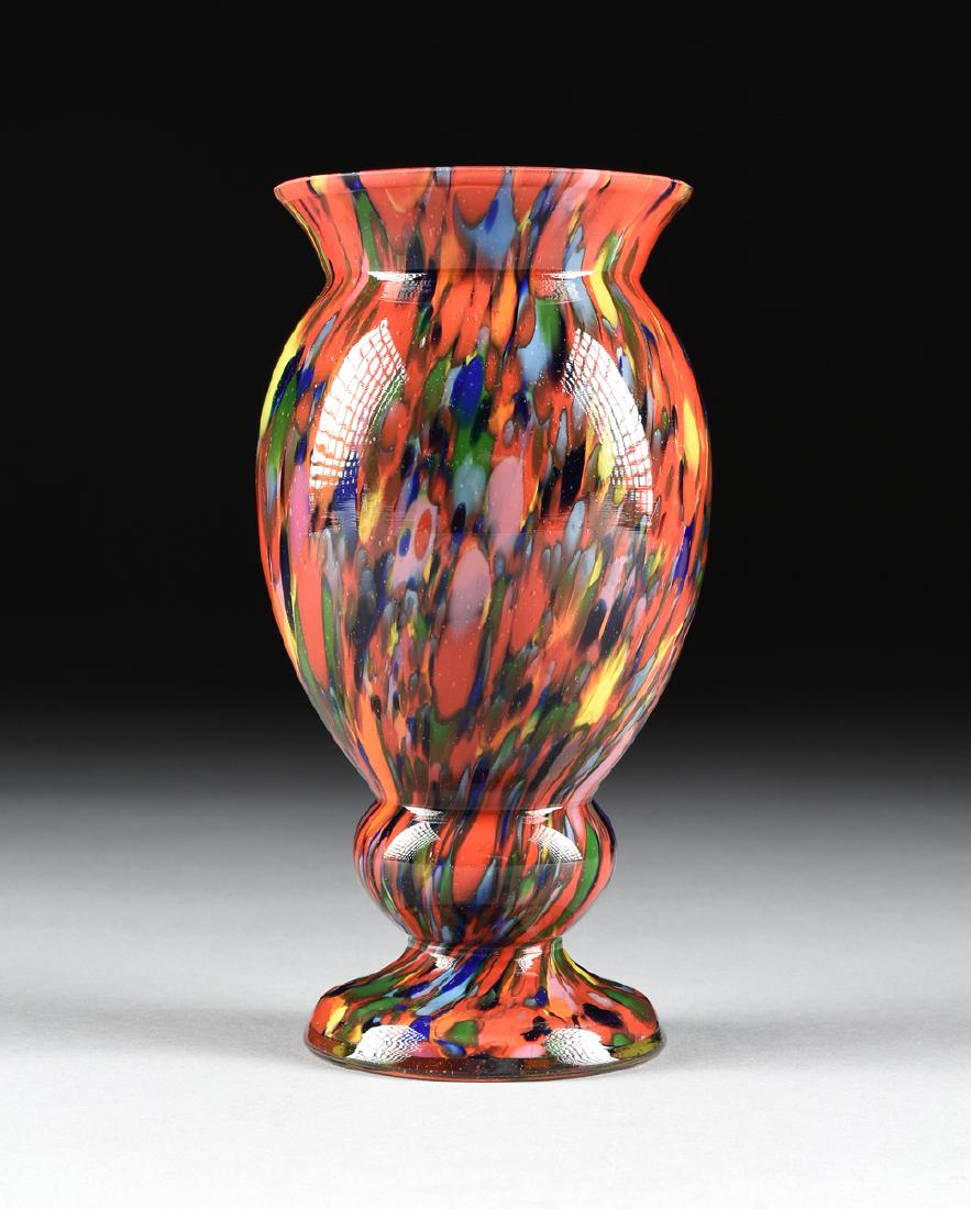 AN ANTON RUCKL CASED RED SPATTER GLASS VASE, NIZBOR,: AN ANTON RUCKL CASED RED SPATTER GLASS VASE, NIZBOR, CZECHOSLOVAKIA (CZECH REPUBLIC), CIRCA 1960-1970, the baluster form vase with six layer spatter decoration. Height: 7 3/4" Diameter: 4 1/8"