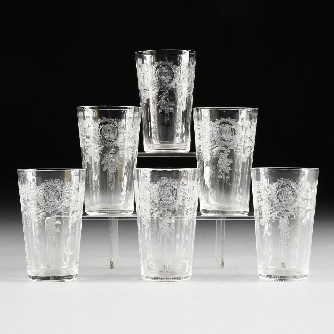A SET OF SIX BOHEMIAN THISTLE ETCHED OPTIC GLASS: A SET OF SIX BOHEMIAN THISTLE ETCHED OPTIC GLASS TUMBLERS, CIRCA 1950, the flaring small tumblers with ribbed sides, etched with trailing thistle decoration. Height: 3 1/2" Diameter: 2 1/4"