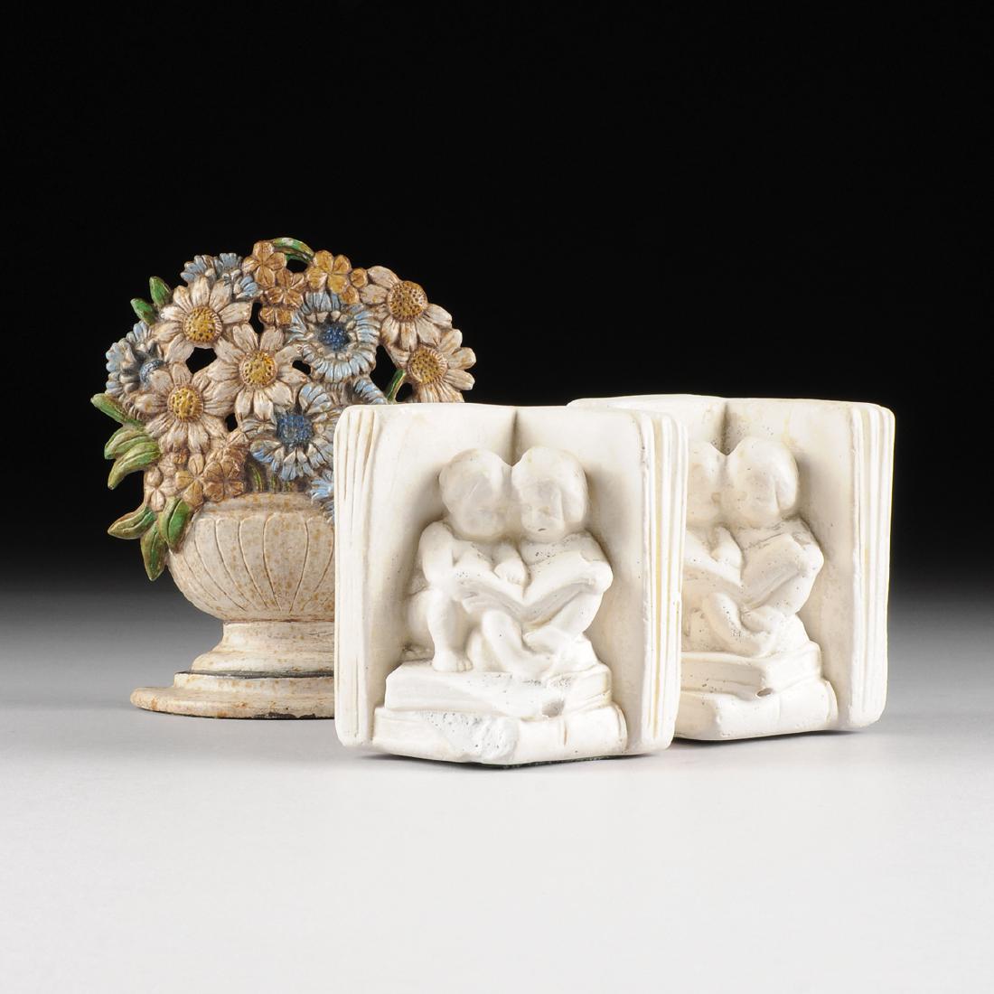 A PAIR OF WHITE PLASTER FIGURAL BOOK ENDS AND ONE (1 of 7)