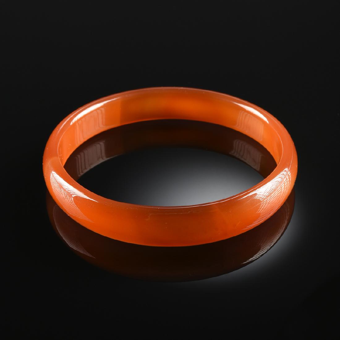 AN ORANGE AND YELLOW AGATE LADY'S BANGLE, (1 of 1)