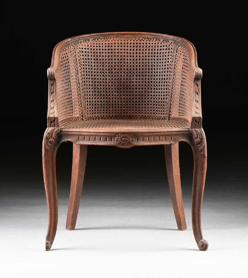 A PROVINCIAL LOUIS XV STYLE CANED OAK BERGÈRE MARQUISE, (1 of 6)