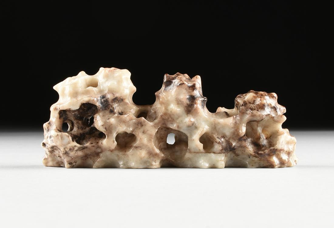 A TANG DYNASTY STYLE CARVED WHITE AND BROWN NEPHRITE (1 of 10)