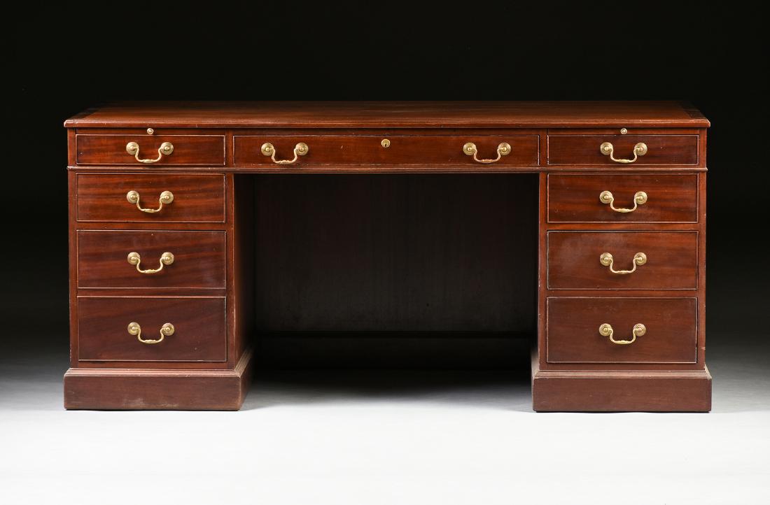 AN AMERICAN MAHOGANY PARTNERS DESK, LAST HALF 20TH: AN AMERICAN MAHOGANY PARTNERS DESK, LAST HALF 20TH CENTURY, the rectangular top over two pull out writing slides, above a central drawer flanked by two short drawers, raised on two pedestals, each wit
