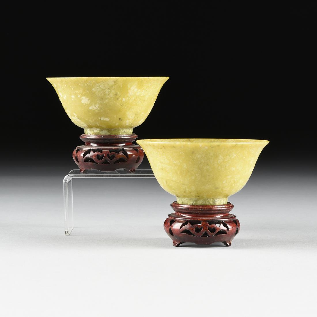 A PAIR OF TRANSLUCENT MOTTLED GREEN JADE BOWLS, (1 of 8)