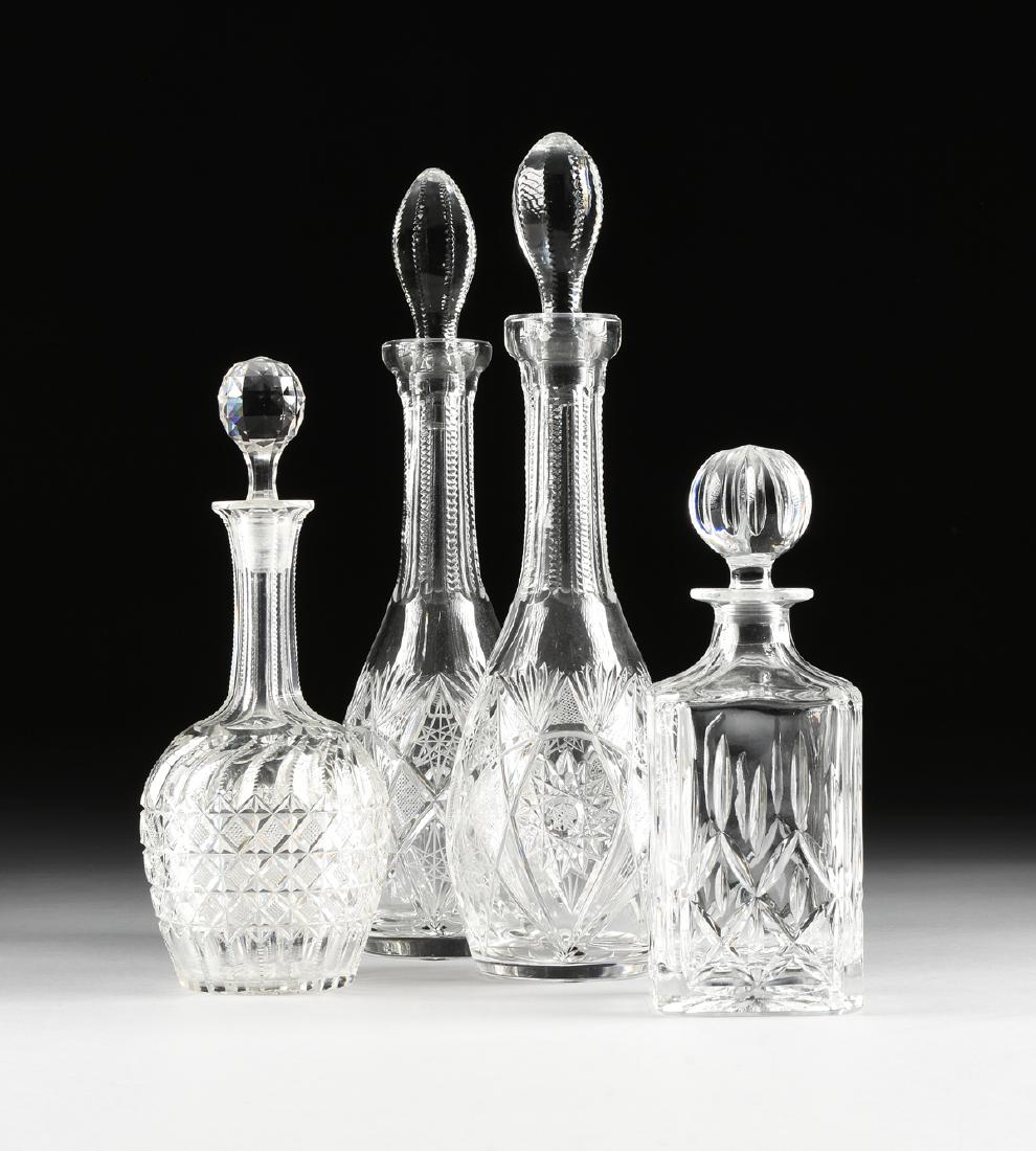 A GROUP OF FOUR CRYSTAL DECANTERS WITH STOPPERS, (1 of 13)