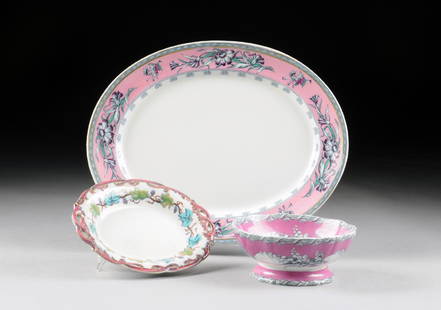 A GROUP OF THREE ENGLISH PINK GROUND SERVING WARES,: A GROUP OF THREE ENGLISH PINK GROUND SERVING WARES, VARIOUS FACTORIES AND IMPRESSED MARKS, 19TH CENTURY, comprising a large Hope & Carter oval platter, Carnation pattern, 1862, with a rim of